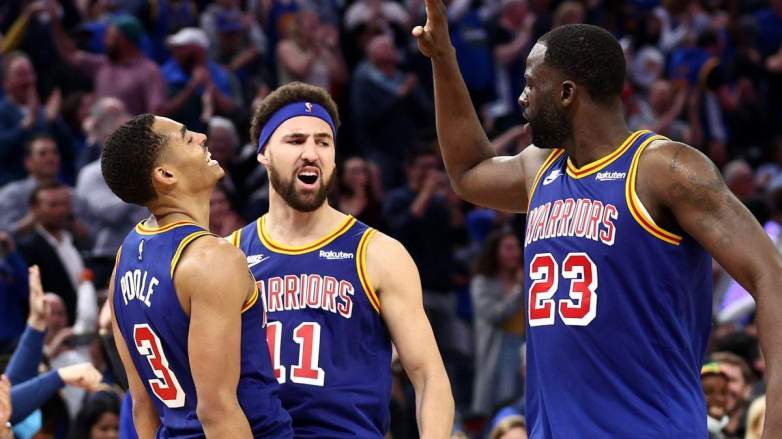 Jordan Poole, Klay Thompson, and Draymond Green of the Golden State Warriors.